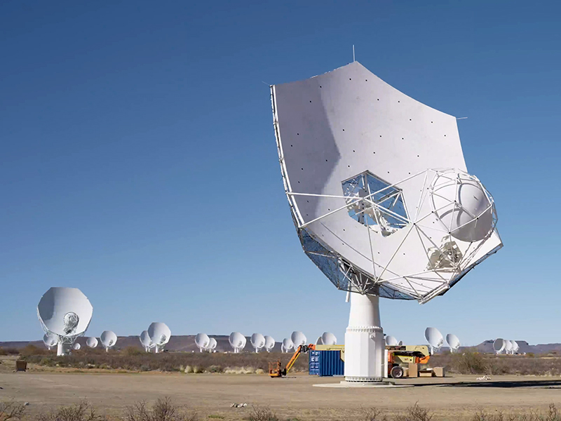 The first SKA-Mid dish testing synchronisation with the MeerKAT dishes.